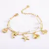 Pulsera de perlas de oro de 18 quilates para mujer, joyería al por mayor, lote mixto de varios estilos, pulsera de concha de estrella de mar con circonita al por mayor