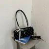 Bolso de hombro con lazo de lunares de moda transfronterizo para mujer, nuevo y elegante bolso de hombro de nicho 2026, bolso de trabajo