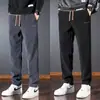 Pantalones casuales estilo coreano, pantalones largos de pana anchos y modernos para hombre de otoño, ropa de trabajo, deportivos, pantalones de chándal de pierna recta