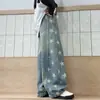 Pantalones de pierna ancha con estampado de estrellas retro y dobladillo festoneado para niña 2026 Nuevas llegadas de otoño Pantalones de pierna ancha para niños medianos y grandes Jeans casuales para niños