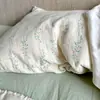 Juego de tres piezas de hilo de algodón de doble capa estilo Ins Una funda de almohada floral de gasa de algodón puro respetuosa con la piel un par de sábanas de color sólido