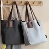 Bolso de hombro único de lona gruesa para uso artístico y diario, transfronterizo, al por mayor, moderno, simple, casual, versátil, bolsa de mano para estudiantes