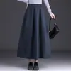 Saia Versátil de Cintura Alta em Linha A Estilo Coreano Moda Outono/Inverno 2026 Saia Midi Flare Casual Feminina Tendência