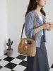 Bolso de nicho transfronterizo modelo nuevo 2026 moda femenina bolso tejido de paja para vacaciones en la playa y la costa, bolso de hombro y cruzado