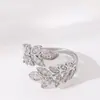 Moda Exquisita y Simple de Amazon Transfronteriza Anillo Abierto Ajustable Forma de Oreja Completamente Incrustado con Circonita Diamante Joyería de Alta Gama