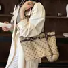 Otoño Invierno Retro Lunares Bolso Tote Mujer 2026 Nuevo Estilo Hebilla de Cuero Gran Capacidad Bolso de Hombro Único Gamuza Bolso de Axila para Viajes