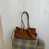 Nuevo bolso de mano de moda transfronterizo para mujer, bolso de hombro o axila minimalista de nicho, bolsa tote de gran capacidad para el día a día