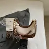 Bolso de Mano de Tela Sintética de Alta Gama tipo Empanada para Mujer, Bolso Cruzado, Nuevo Modelo de Moda Verano 2026 Versátil Bolso de Cadena para Hombro o Axila