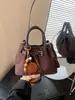 Bolso de diseño único para mujer, nuevo bolso cubo retro estilo coreano de ante, elegante bolso de hombro y bolso cruzado
