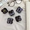 Pinza de Garra Hueca Flor Chocolate para Mujer 2026 Nuevo Clip de Tiburón de Gama Alta para Moño en la Parte Posterior de la Cabeza Accesorios para el Cabello