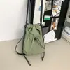 Bolsa de Cubo Fresca Estilo Coreano con Cordón Alto Valor Estético Textura Tela de Nylon Elegante Bolso de Hombro Pequeño Lindo Bolso de Hombro Cruzado Individual