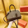 Moda Retro Europea y Americana Bolsita de Concha Personalidad Floral Nuevo Estilo Otoño/Invierno 2026 Bolso de Hombro Versátil con Temperamento para Mujer