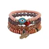 Venta Caliente Transfronteriza Estilo Bohemio Ojo Maligno Palma Aleación Colgante Cuerda Elástica Multicapa Pulsera de Perlas