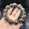 Venta al por mayor del fabricante Pulsera de cuentas Dzi de Xizang 16 mm Negra y Blanca Dzi Weathered B
