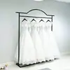 Suporte de exposição para vestidos de noiva Cabide para vestidos de noiva Loja de vestidos de noiva Little Red Book Vestido formal cauda longa Roupas para pendurar Xiuhe Suporte de chão espessado