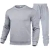 Conjunto de sudadera con cuello redondo y pantalón de chándal para hombre, color liso, otoño e invierno, conjunto casual de dos piezas con manga larga para hombre