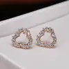 Pendientes coreanos de temperamento simple y dulces con forma de corazón de diamante hueco, pendientes para mujer, joyería para orejas, venta al por mayor