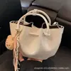 Bolso Cubo Portátil Estilo Coreano para Mujer 2025 Nuevo de Moda Simple Versátil Bolso de Hombro Único Cruzado Bolso Cubo de Nicho
