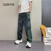 Primavera 2026 Nuevos Pantalones Deportivos Casuales Holgados Estilo Calle Color Bloque Secado Rápido Marca de Moda Coreana Pantalones Largos para Hombre