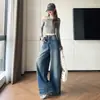 Tiro real 2026 súper calientes pantalones anchos retro para mujer otoño nuevo estilo de alta gama diseño esmerilado lavado sentido del diseño jeans holgados