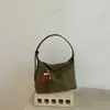 Bolso de mano para mujer, nueva colección de otoño 2026, estilo retro, gran capacidad, adecuado para el uso diario y para ir al trabajo, versátil y que irradia un ambiente sofisticado; un bolso de hombro que se puede llevar debajo del brazo