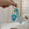 Llavero de Botella de Arena Líquida de Dibujos Animados, Pequeños Regalos para Puestos, Accesorios Acrílicos al por Mayor, Colgante Relleno de Aceite, Rasca Gatos Lindo de Regalo