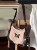 Bolso para Axila de Chica Cool Dulce Oscuro Estilo Retro Mariposa Bloqueo de Color Bolso de Motociclista para Mujer 2026 Nuevo Estilo Americano Bolso de Hombro Único Cruzado