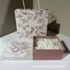 Caja plegable para loción corporal Oushu Bolsa de regalo Empaque Caja vacía Bolsa de regalo Crema de manos Gel de ducha Caja de empaque Kraft Papel