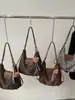 Bolso tote popular de estampado de leopardo estilo coreano diseño de nicho transfronterizo para mujer, gran capacidad, tendencia retro, bolso de un solo hombro, bolso de viaje