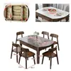Mesa y sillas de comedor sencillas y elegantes para uso doméstico, con un marco de madera maciza que se puede ajustar para adaptarse tanto a mesas cuadradas como redondas, con una superficie de mesa duradera de piedra para comer