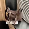 Bolsa Baguete Portátil Retro Coreana para Mulheres Inverno 2025 Nova Bolsa de Ombro Único Transversal Estilo Ocidental com Retalhos de Alta Qualidade