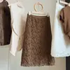 Saia midi de renda patchwork delicada estilo francês para mulheres, nova coleção de outono, elegante cintura alta versátil afunilada em A.