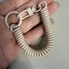 Chaveiro de Corda de Mola de Plástico, Fivela de Porta Pintada, Cordão Elástico Anti-Perda, Chaveiro de Corda de Mola de Liga Colorida
