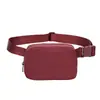 Bolso Lulu del mismo estilo en stock, riñonera antisalpicaduras, riñonera deportiva de nailon para correr, riñonera para teléfono móvil para hombres y mujeres.
