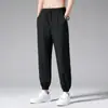 Pantalones ligeros de seda helada de verano, pantalones deportivos de secado rápido para hombre, pantalones casuales rectos fluidos, pantalones largos holgados de talla grande para hombre