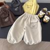 Pantalones Deportivos para Niños 2026 Primavera y Otoño Nuevos Pantalones de Chándal con Bolsillos de Dibujos Animados para Niños, Pantalones Largos Versátiles para Niños Pequeños y Niños
