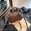 Bolsa de Mão Retrô 2025 Nova Moda Bolsa Feminina de PU Macio Estilo Coreano Pequena Bolsa de Ombro Textura de Nicho Mini Bolsa Transversal
