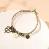 Conjunto de 5 Peças de Colar, Pulseira, Anel e Brincos de Trevo de Quatro Folhas da Sorte Europeu e Americano Mais Vendido, Conjunto de Joias de Flor de Cinco Pétalas para Mulheres