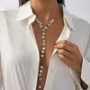 Collar Largo de Estilo de Lujo Accesible Transfronterizo Europeo y Americano con Perlas de Imitación Cbb Brillantes y Borla de Disco Metálico Exagerada para Mujer