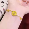 Pulsera de calabaza mariposa oro antiguo de alto color láser tienda de oro con joyería flash nicho lujo cuatro hojas