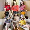 Puesto Ambulante de 10 Yuan Modo Transmisión en Vivo de Alto Volumen Fuente de Ropa para Mujer Mercado Nocturno Venta Caliente Camisetas de Manga Corta para Mujer Ropa Barata al Por Mayor