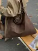 Bolsa Feminina Casual de Grande Capacidade 2026 Novo Modelo Versátil Bolsa Transversal para o Dia a Dia Estilo Descontraído Bolsa Tote Bolsa Saco