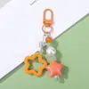 Chaveiro de Carro Estrela Pintada Colorida Pingente de Estrela de Cinco Pontas Colorido Doce Pingente de Bolsa Pérola Venda por Atacado