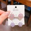 Pendientes de flor de cristal de circonita rosa y púrpura con diseño avanzado 2024, nuevos y elegantes pendientes de plata con broche de celebridad de Internet.