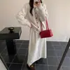 Jaqueta Suéter Macia e Cericosa para Mulheres no Outono e Inverno Novo Estilo Casual Peça Externa Cardigan Tricotado Preguiçoso Saia Meia Conjunto de Duas Peças