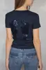 Moda cruzada europea y americana de otoño e invierno, sudadera casual con lentejuelas de ala para mujer y conjunto de dos piezas de color liso versátil, venta al por mayor