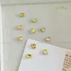 Pedras de strass para manicure douradas, modernas e deslumbrantes, apresentando designs de floco de neve, estrela de cinco pontas e cristal de vidro redondo com base pontiaguda, usadas como acessórios decorativos