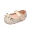 Zapatos de princesa nuevos de primavera y verano con lazo de purpurina suela de goma para niña pequeña zapatos de bebé zapatos de bebé al por mayor total 2572
