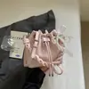 Moda Estilo Coreano Bolso Cubo con Cordón para Mujer 2026 Verano Nuevo Bolso de Hombro Cruzado Nube Bolso de Mano Simple de Nicho