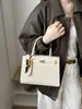 Bolsa elegante e minimalista de PU trançado para mulheres, nova coleção 2026, bolsa de ombro, bolsa transversal, adequada para o trajeto diário e negócios, bolsa quadrada pequena, bolsa de mão